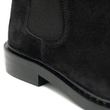 Walk London Darcy Star Chelsea Boot in black suede, close-up shot of the heel with white background